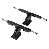 Tynee TKP electric skateboard trucks viewed from another angle, showing the kingpin assemblies and mounting baseplates.